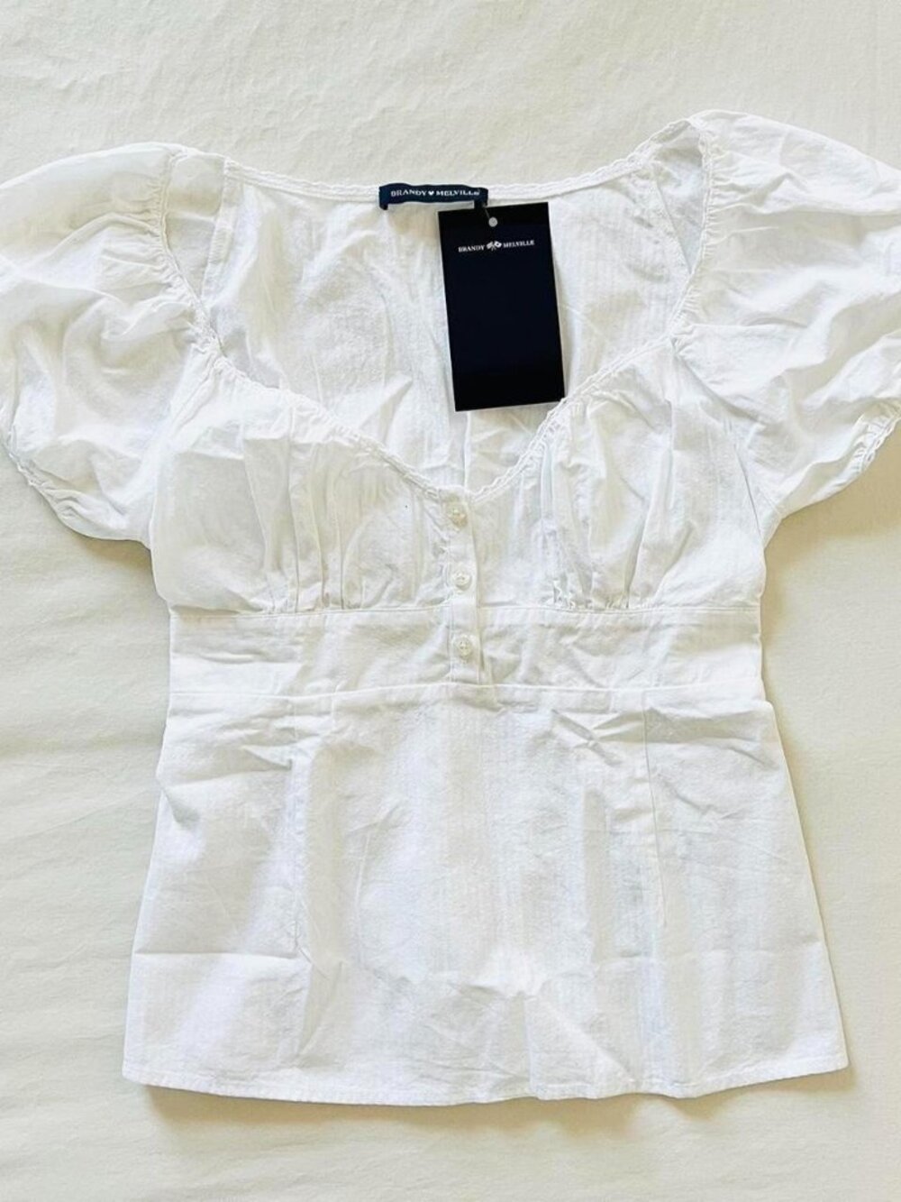 BNWT Brandy Melville-John Galt White Blair babydoll ruffle top with buttons 20 x